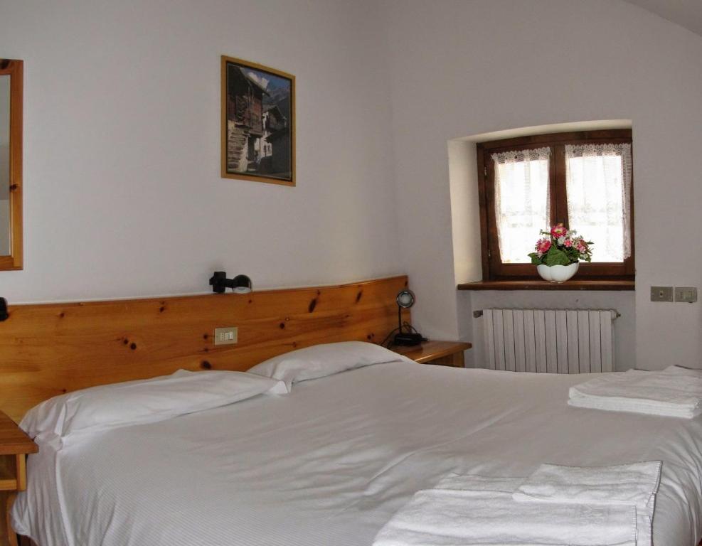 Postel nebo postele na pokoji v ubytování Casa Vacanze Ca' De Val