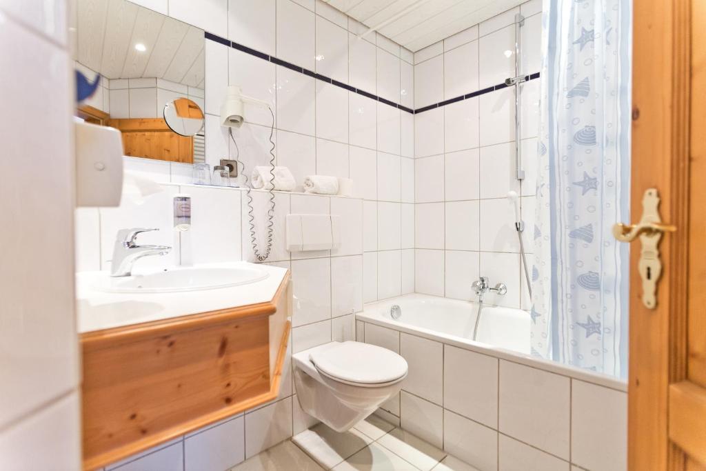 Koupelna v ubytování AKZENT Hotel Krone