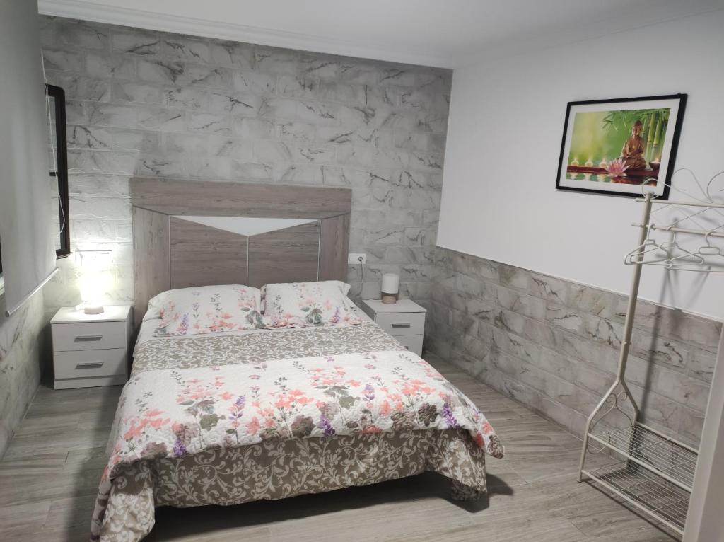 Posteľ alebo postele v izbe v ubytovaní Apartamento Daniela 1