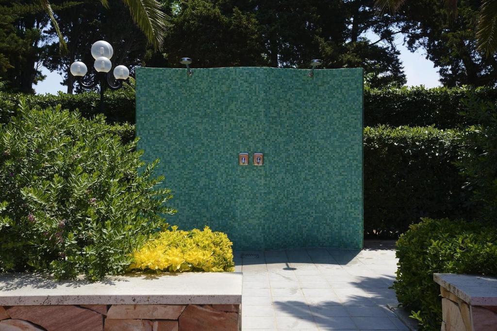 Een tuin van Residence Oasis