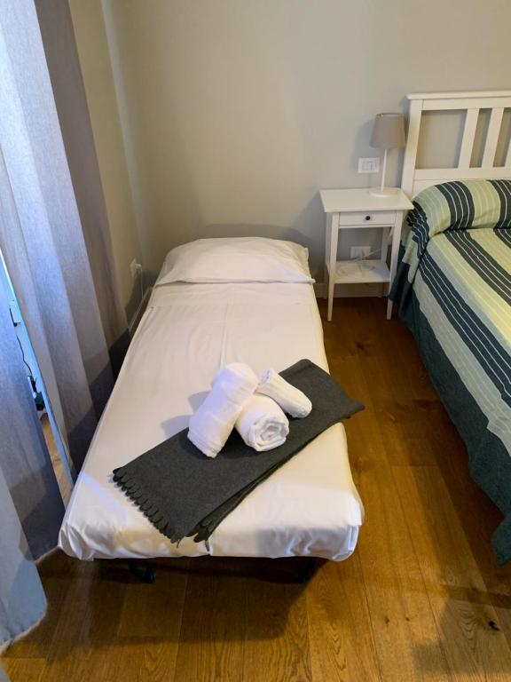 A bed or beds in a room at La Casetta del Flaminio a Roma Centro