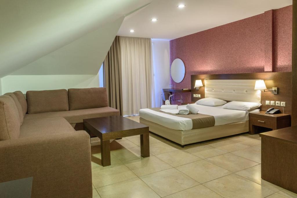 Postel nebo postele na pokoji v ubytování Hotel Giannoulis