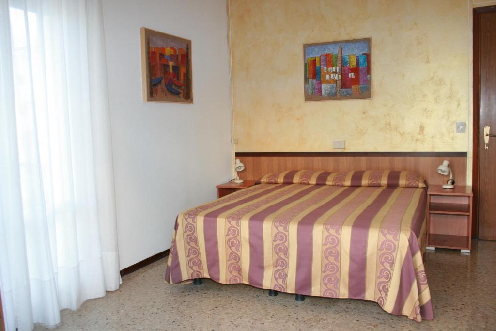 Postel nebo postele na pokoji v ubytování Hotel Antille e Azzorre