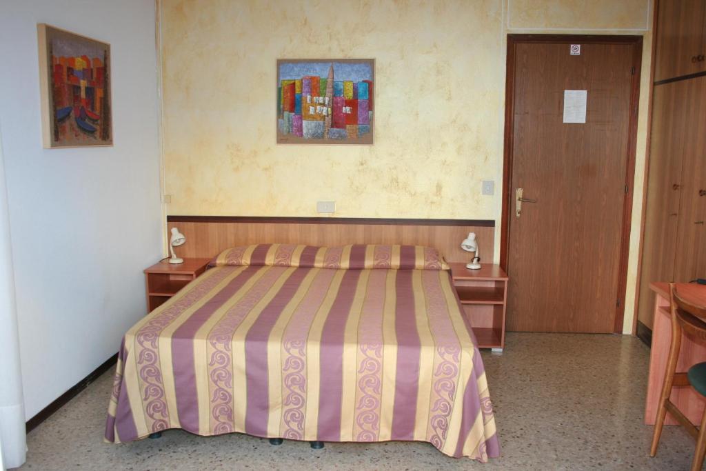 Postel nebo postele na pokoji v ubytování Hotel Antille e Azzorre