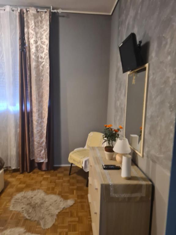 TV a/nebo společenská místnost v ubytování Petalo rosso
