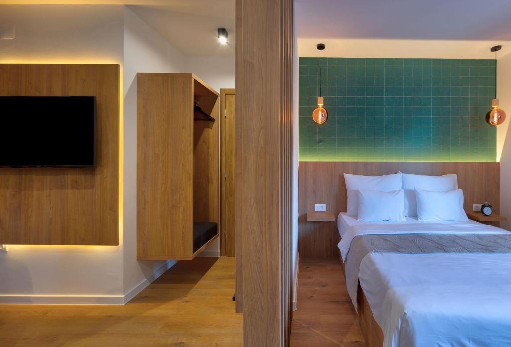 Postel nebo postele na pokoji v ubytování Hotel Sinan Han