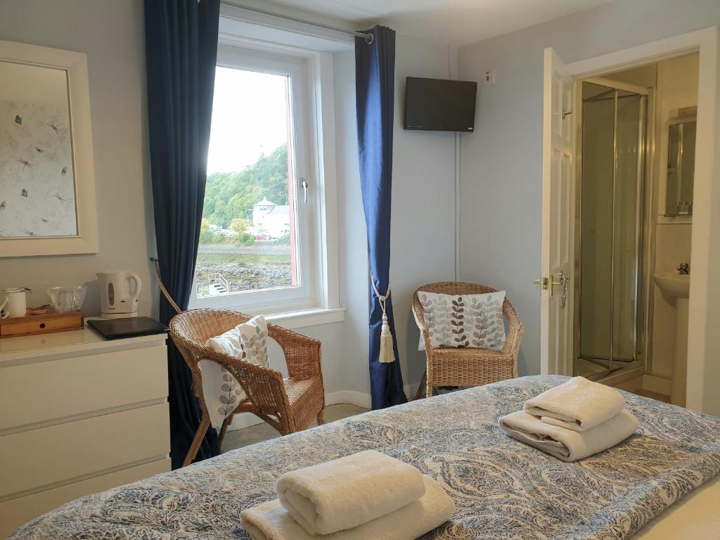 Postel nebo postele na pokoji v ubytování Carnaburg Guesthouse