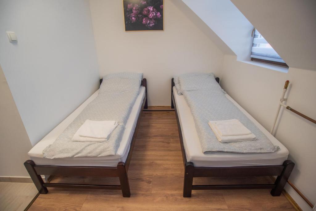 Postel nebo postele na pokoji v ubytování Reneszánsz Vendégház