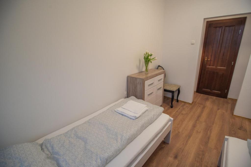 Postel nebo postele na pokoji v ubytování Reneszánsz Vendégház