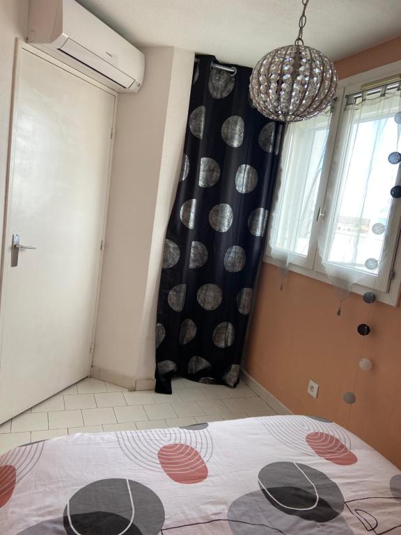 Postel nebo postele na pokoji v ubytování Appartement grande terrasse Climatisé
