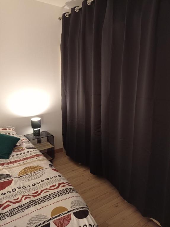 Postel nebo postele na pokoji v ubytování Résidence Bel Air