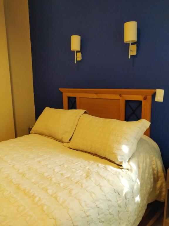 Postel nebo postele na pokoji v ubytování Anden Inca Hotel