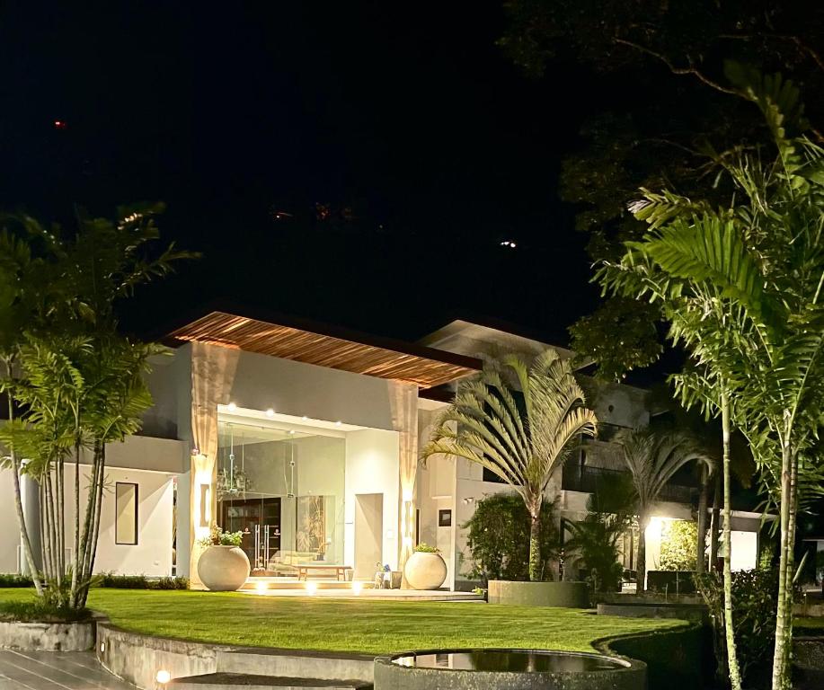 a house at night with a garden at The Haven - Hotel & Spa, Health and Wellness Accommodation - Adults Only in Boquete