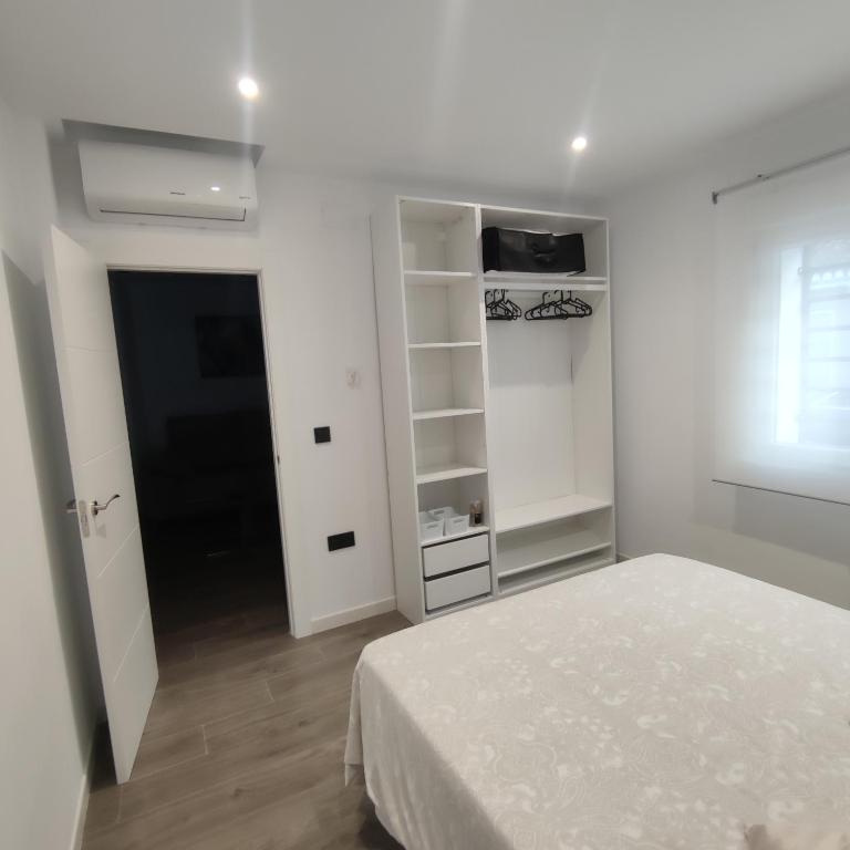 Posteľ alebo postele v izbe v ubytovaní Casa de la Ilusión