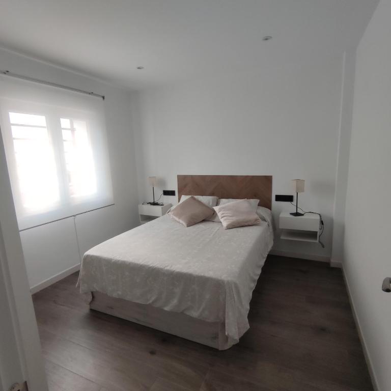 Posteľ alebo postele v izbe v ubytovaní Casa de la Ilusión
