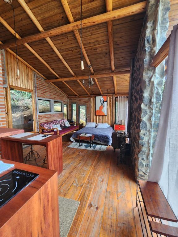 Tiny Houses O Olival - aluguel temporadaにあるシーティングエリア