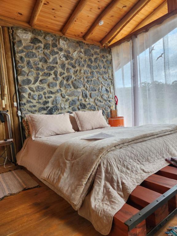 Tiny Houses O Olival - aluguel temporadaにあるベッド