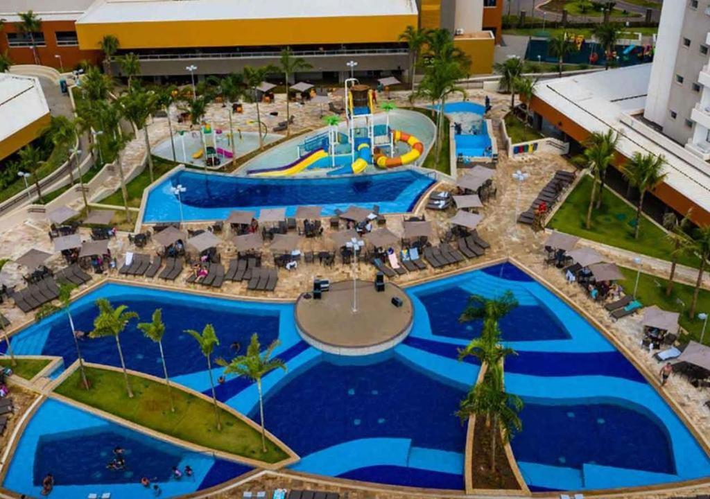 an overhead view of a swimming pool at a resort at Solar das Águas Resort in Olímpia