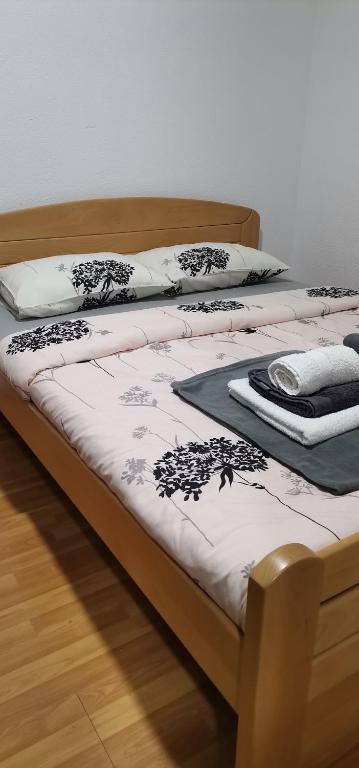Postel nebo postele na pokoji v ubytování Apartman MAŠA