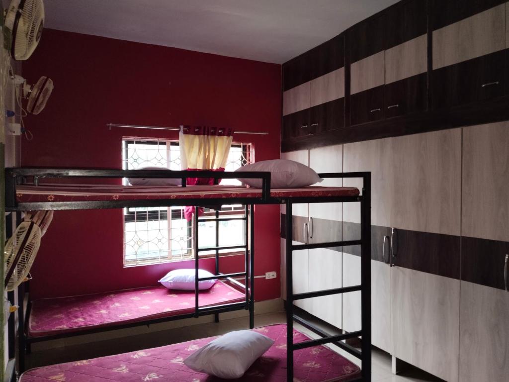 Voodi või voodid majutusasutuse UTKARSH HOTEL toas