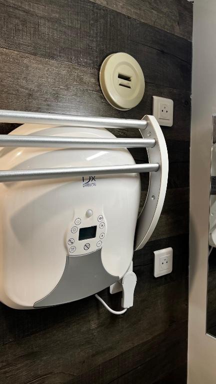 a close up of a toilet in a bathroom at Embrun - Appartement 4&#47;6 personnes avec extérieurs in Embrun