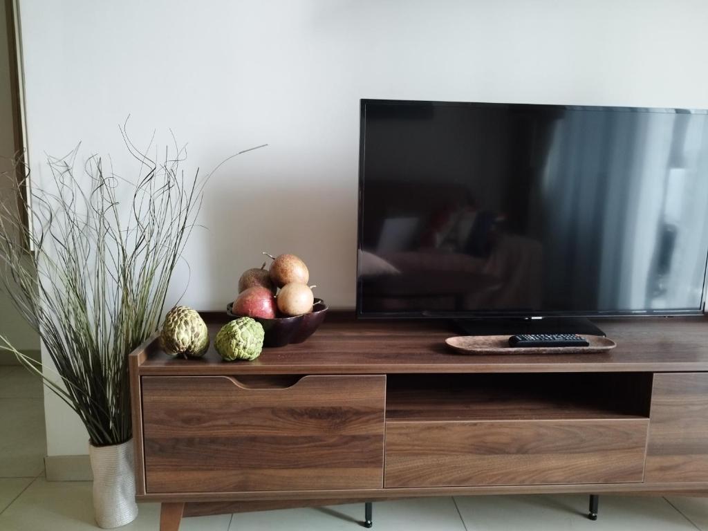 TV a/nebo společenská místnost v ubytování Unixx Pattaya