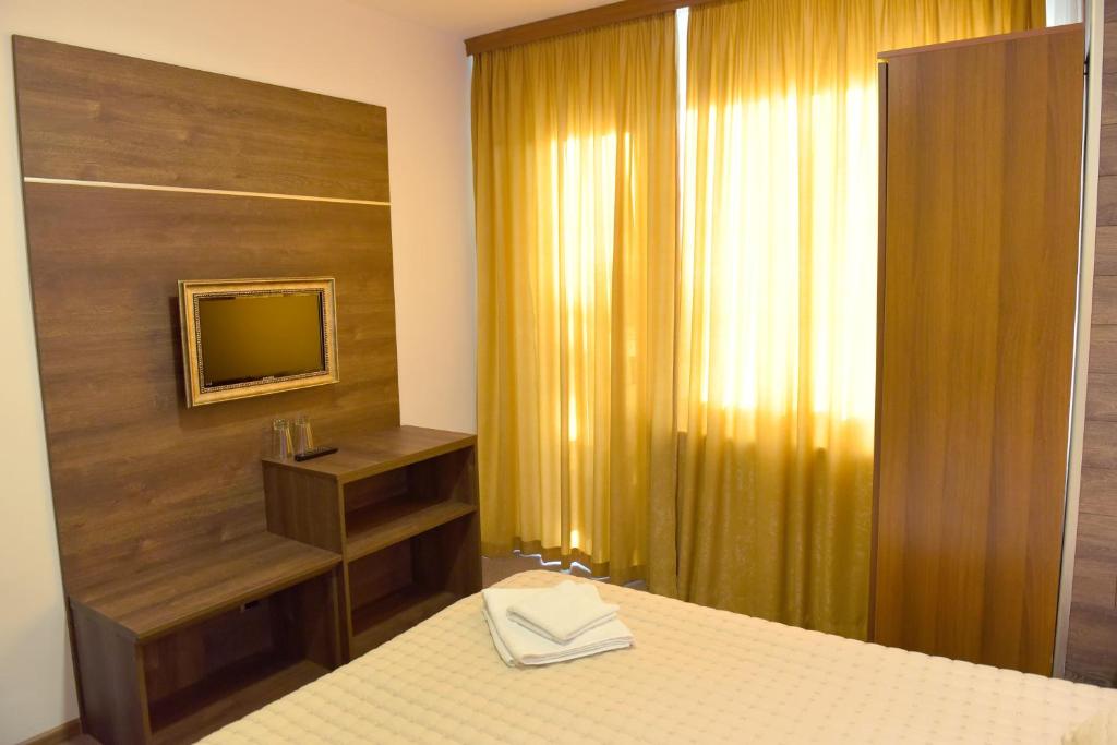 Postel nebo postele na pokoji v ubytování Hotel Rothmans-Breakfast - Free parking - Lobby