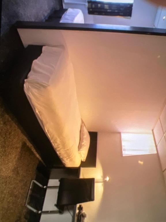 Postel nebo postele na pokoji v ubytování Hotel Le Beau Rivage