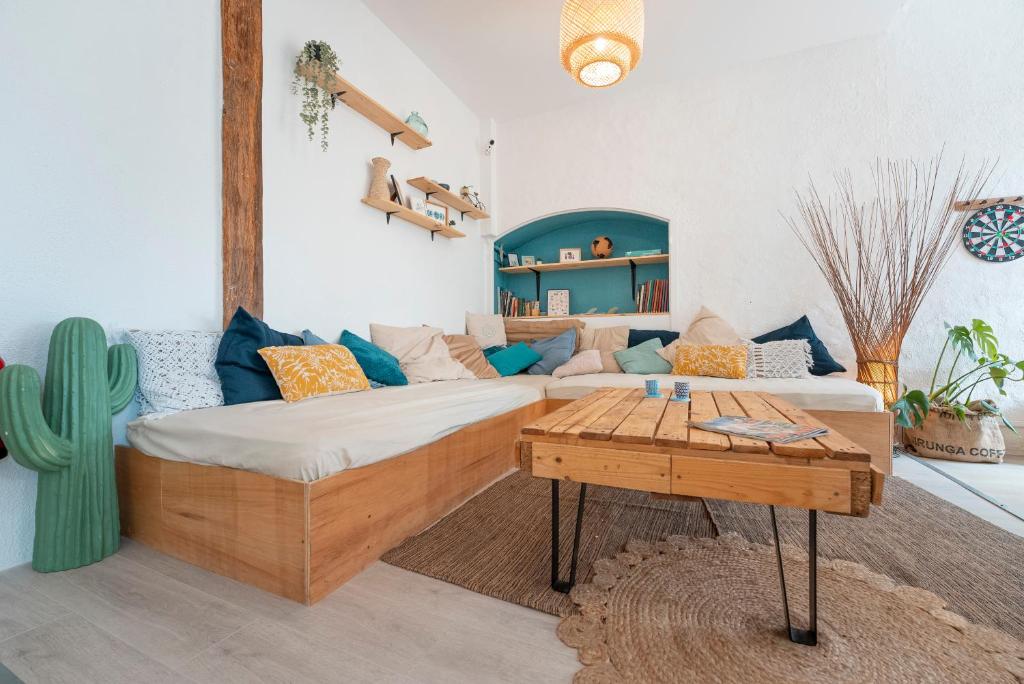 Posezení v ubytování GARDEN - Utopy Hostel