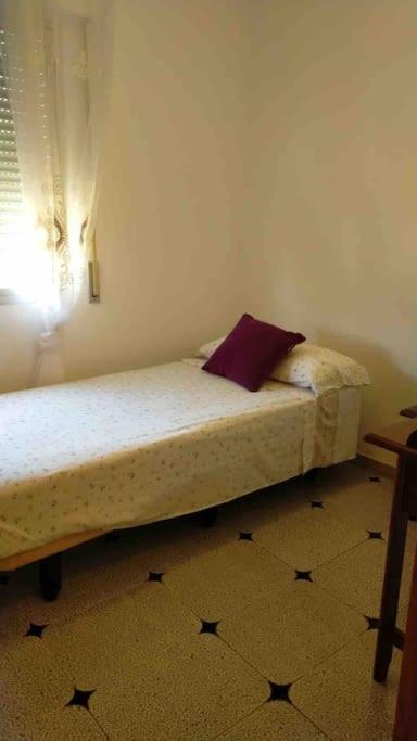 Postel nebo postele na pokoji v ubytování Precioso piso de 3 dormitorios, cocina y 1 baño