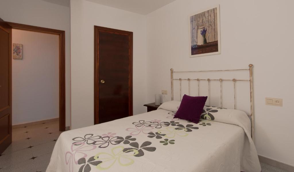 Postel nebo postele na pokoji v ubytování Precioso piso de 3 dormitorios, cocina y 1 baño