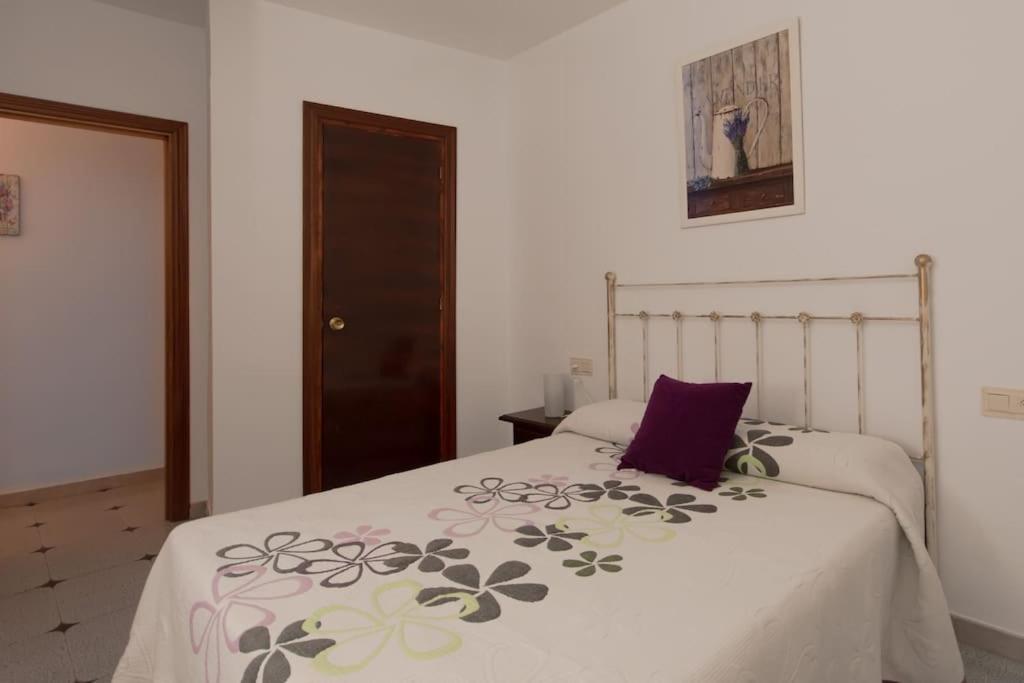 Postel nebo postele na pokoji v ubytování Precioso piso de 3 dormitorios, cocina y 1 baño