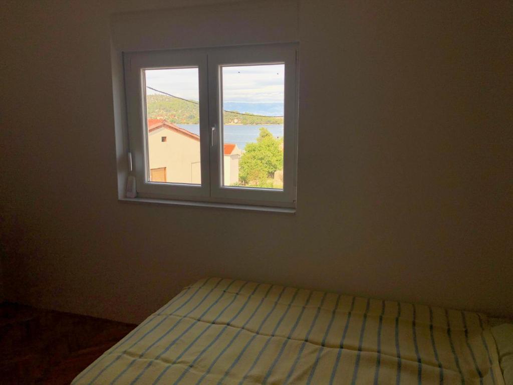 Posteľ alebo postele v izbe v ubytovaní Charming new house on islandfew steps from the sea