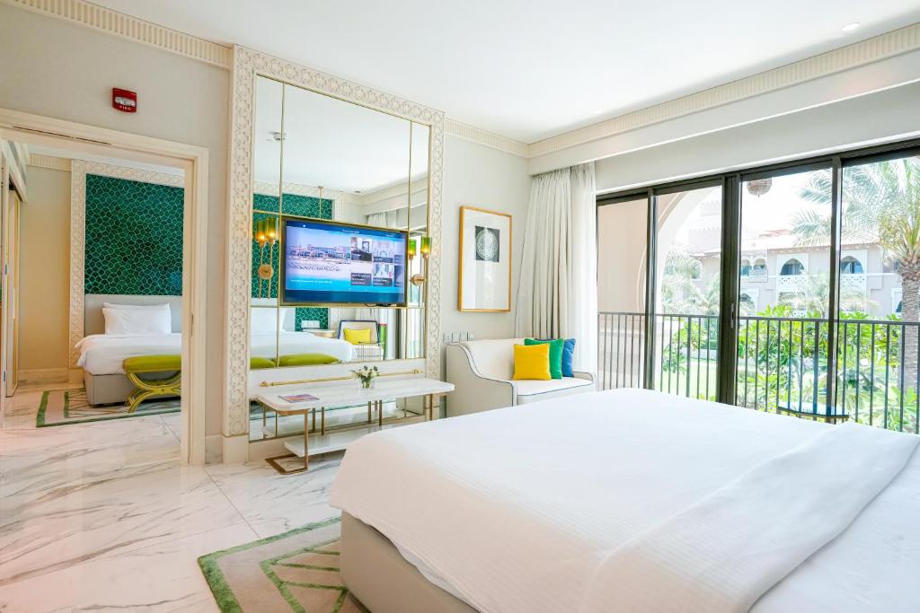 Postel nebo postele na pokoji v ubytování Rixos Premium Saadiyat Island - All Inclusive