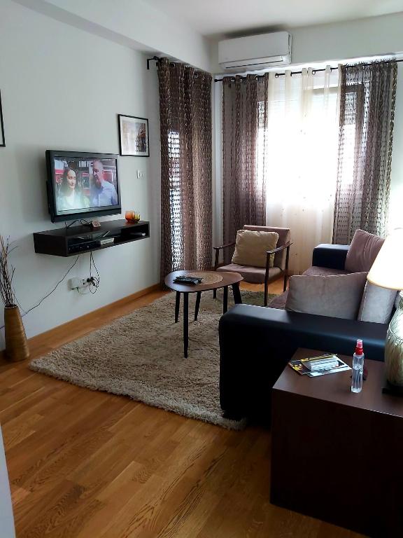 TV a/nebo společenská místnost v ubytování Apartman Miss T
