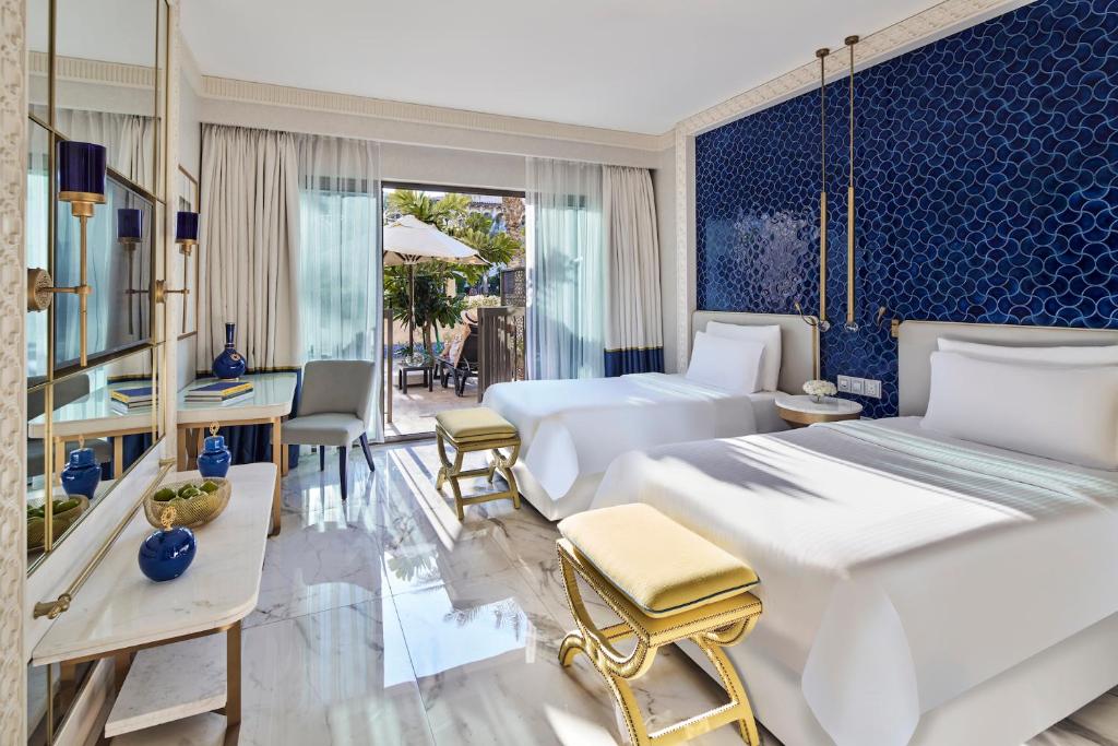 Postel nebo postele na pokoji v ubytování Rixos Premium Saadiyat Island - All Inclusive