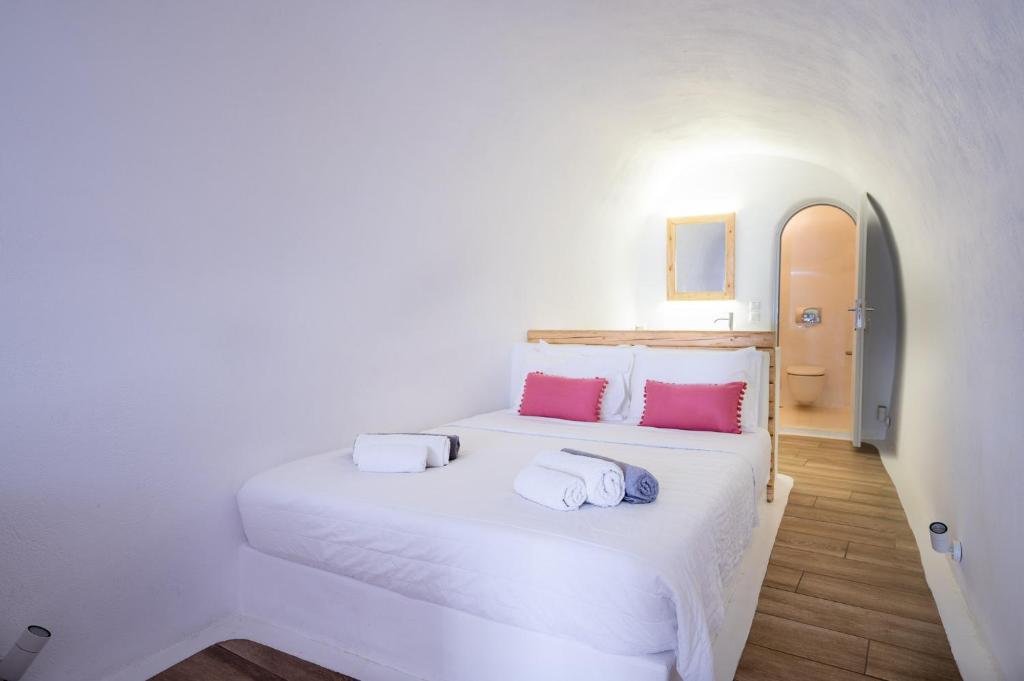 Letto o letti in una camera di Karpimo Suites