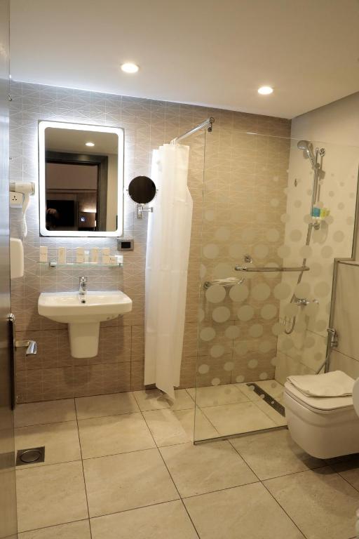 Kúpeľňa v ubytovaní Nishan Hotel