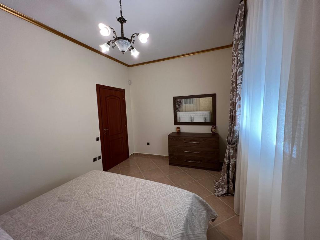 Postel nebo postele na pokoji v ubytování SOFIA APARTMENTS