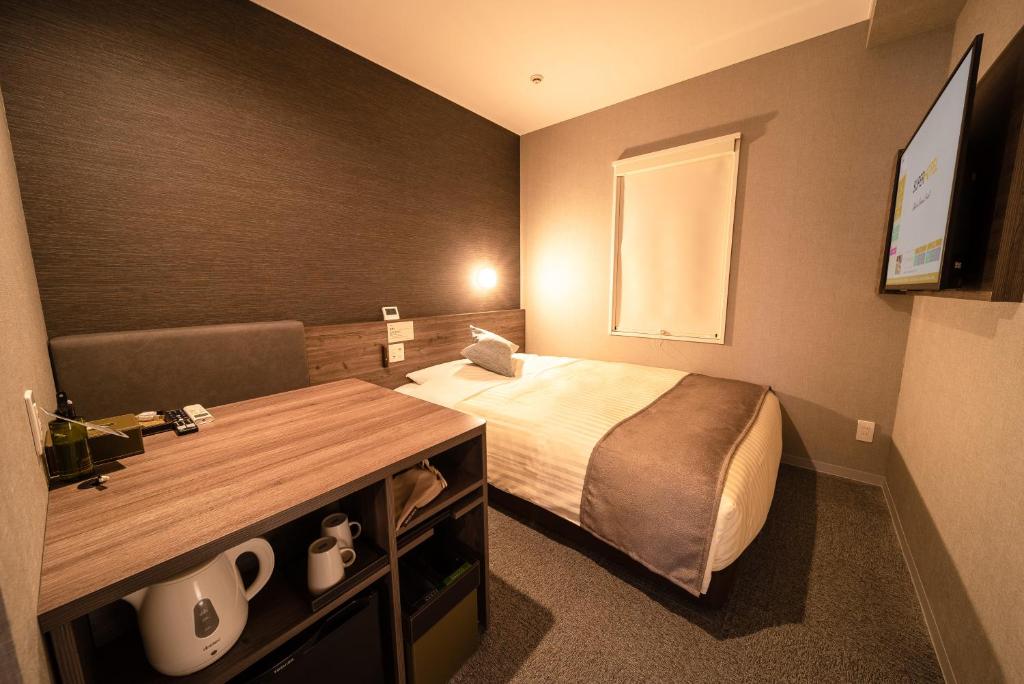 TV a/nebo společenská místnost v ubytování Super Hotel Premier Ikebukuro Natural Hot Spring