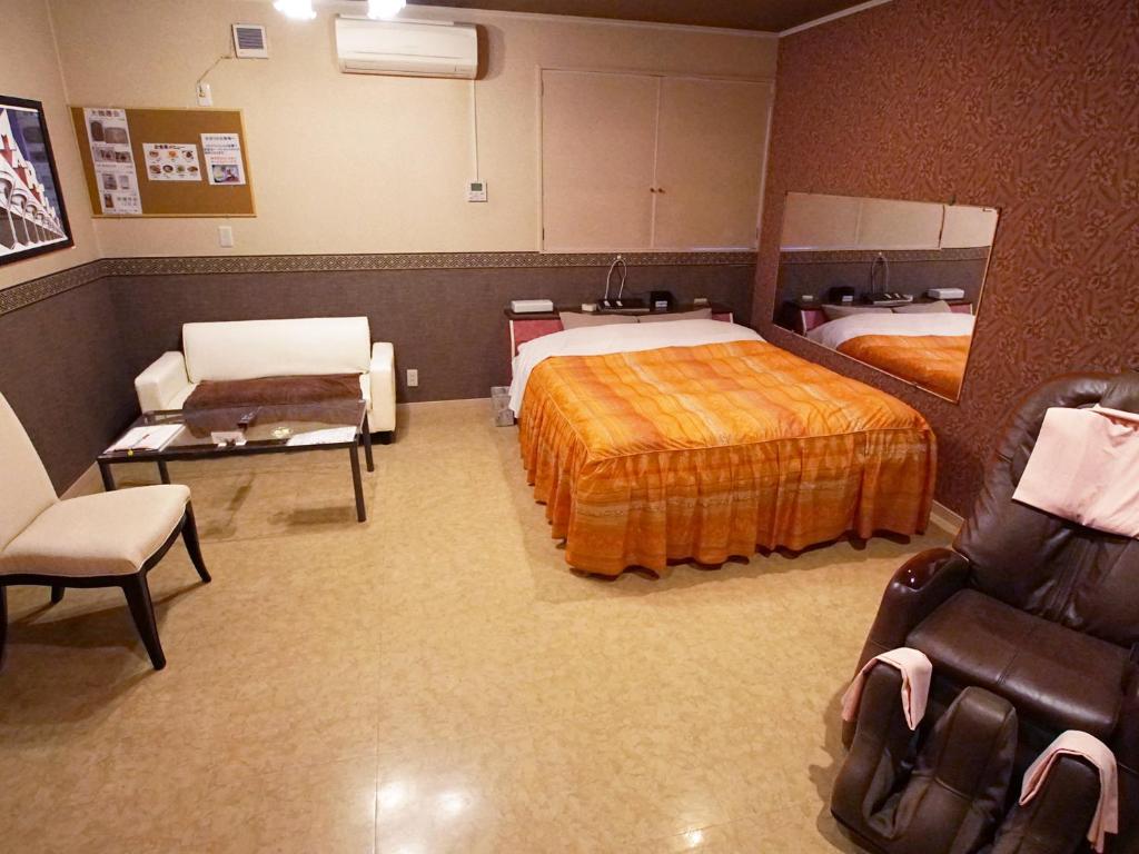 Postel nebo postele na pokoji v ubytování Mariage Leisure Hotel