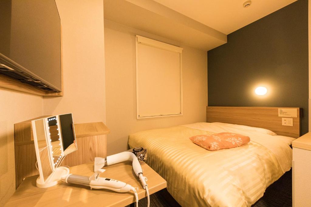 TV a/nebo společenská místnost v ubytování Super Hotel Premier Ikebukuro Natural Hot Spring