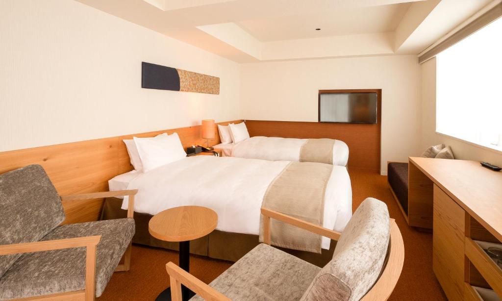 TV a/nebo společenská místnost v ubytování HOTEL RINGS KYOTO