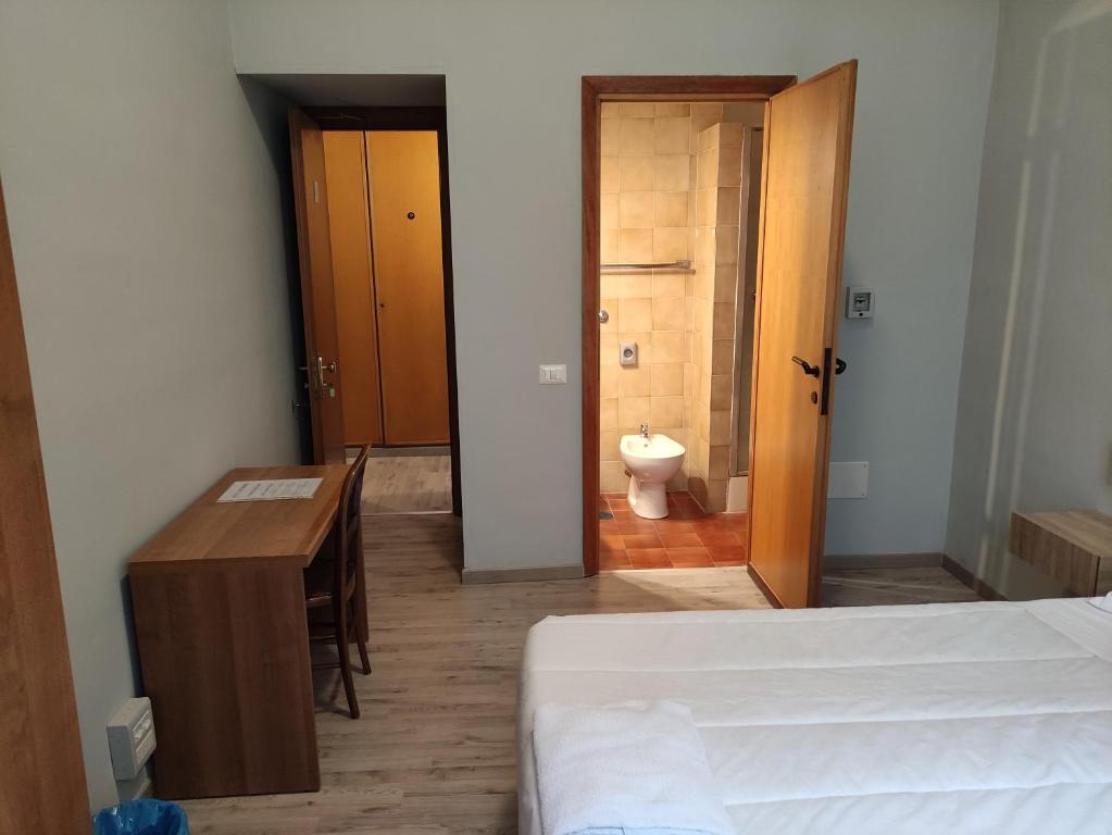 Postel nebo postele na pokoji v ubytování Hotel Big Bang