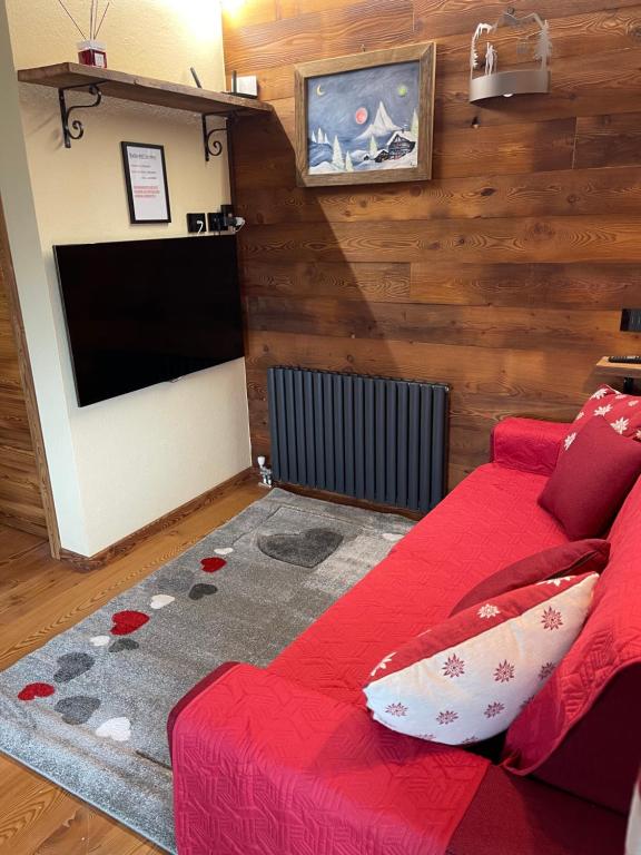 Telewizja i/lub zestaw kina domowego w obiekcie Baita del Cervino CIR n 0016
