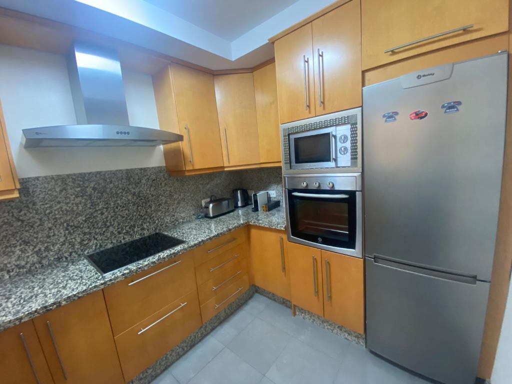 Kuchyňa alebo kuchynka v ubytovaní Apartamento con terraza sobre La Marina de Sotogrande