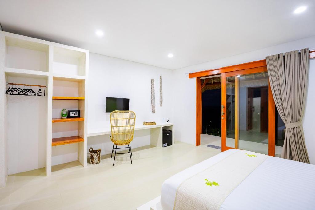 Postel nebo postele na pokoji v ubytování Lombok Khophilauvillas