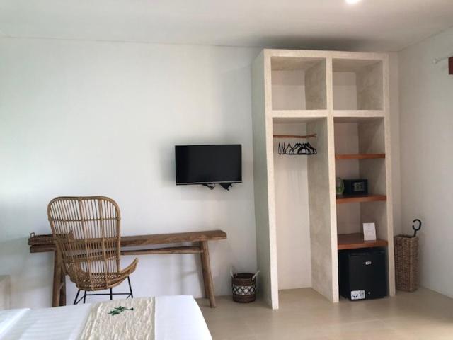 TV a/nebo společenská místnost v ubytování Lombok Khophilauvillas