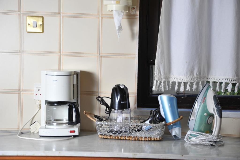 Kuchyň nebo kuchyňský kout v ubytování IRENE cottage