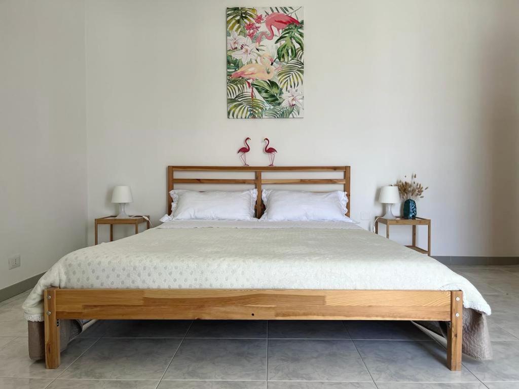 Una cama o camas en una habitación de Sorelle Casa Vacanza